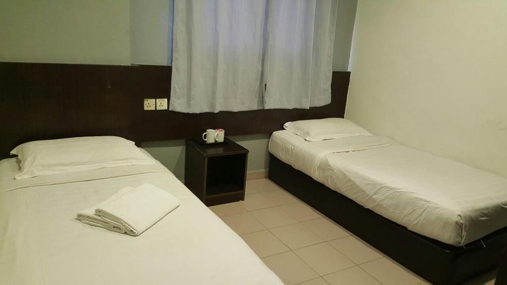 Tiong Nam Hotel Пасир-Гуданг Экстерьер фото